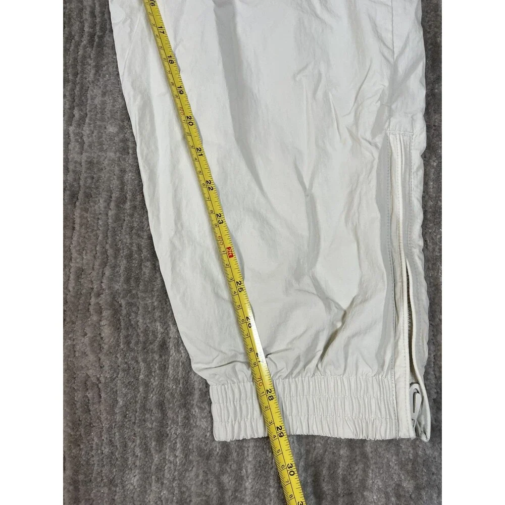 Nike Track Pants Mens Medium White Solo Swoosh Loose Fit Taper Leg Stacked New